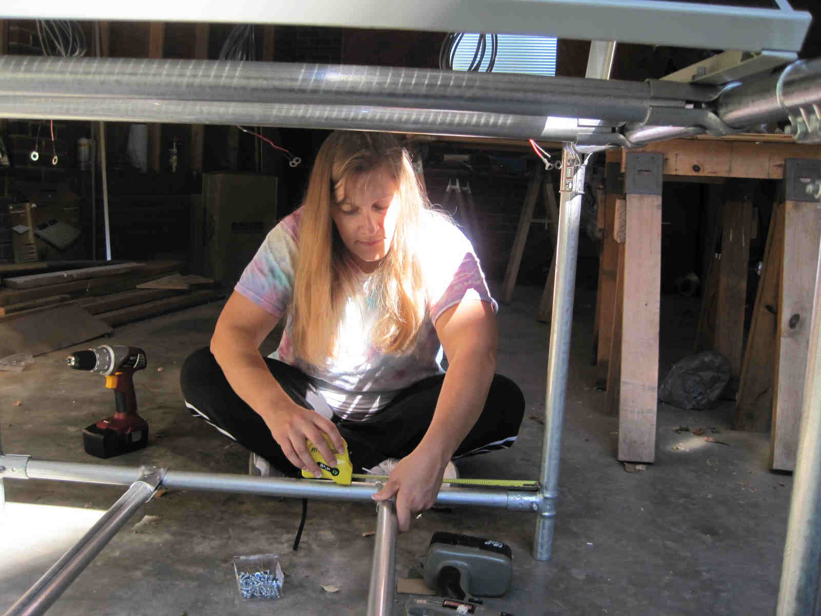 Nadine works on fabricating a custom stand for the solar panel array to be installed at Harrisburg Middle School